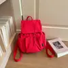 Mochila nueva de moda de color liso, mochila de viaje, adecuada para estudiantes de secundaria y universidad, portátil y elegante, ideal para viajes cortos