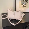 Alto Valor Estético Verano 2026 Nuevo Estilo Bolso Cubo de Cuero Texturizado Simple Bolso Dumpling Bolso Cruzado de Hombro Único para Mujer