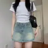 Saia Jeans Cintura Alta Feminina Primavera Fina Tamanho Grande Menina Cheinha Saia que Cobre a Barriga Tipo Pera Saia Pequena em Linha A