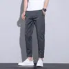 Calça Casual Masculina Slim Fit, Versátil para Primavera/Verão, Calça Branca Estilo Coreano Slim Fit, Calça Masculina com Stretch