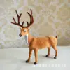 Animal de simulación ciervo sika simulación alce jirafa modelo animal de piel accesorios de decoración para cine y televisión venta al por mayor