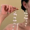 Pendientes de Borla Blancos con Diseño Floral Frío y Elegante, Estilo Francés Retro en Forma de Campana, Pendientes de Gama Alta Hermosos y Únicos