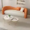 Sofá estilo crema nórdico para salas de estar pequeñas, sofá curvo de lujo ligero, sofá de forma especial para salón de belleza, popular estilo wabi-sabi