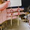 Pendientes de lazo de terciopelo rojo con ambiente de moda, temperamento femenino, flor dulce, borla larga, pendientes Joker al por mayor