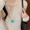 Colar longo com pingente de flor de dopamina para mulheres, adequado para looks e vestidos de verão, corrente para clavícula, acessório de design de nicho
