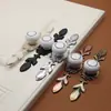 Filme Base Branco Marfim Alça de Liga de Zinco Cerâmica Estilo Europeu Gaveta Guarda-Roupa Porta de Armário Ferragens para Móveis Alça Fábrica Direta