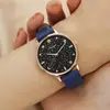 2026 Novidade Relógio Redondo Estrela Lua com Pulseira de Couro Temperamento Decorativo Feminino Liga de Zinco Quartzo Venda Direta da Fábrica
