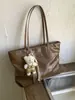Bolsa Tote Simples de Moda Transfronteiriça Grande Capacidade 2025 Nova Bolsa de Ombro Portátil Bolsa para Deslocamento Bolsa de Axila da Moda