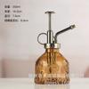 Venta al por mayor de fábrica zakka comestibles vintage relieve regadera tetera para regar suculentas tetera para regar color jardinería regadera tetera