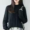 Elegante suéter de algodón 100% con patrón de diamantes y cuello alto parcial para mujer, camisa base de punto moderna y versátil para otoño e invierno
