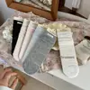 Meias Largas Songmu 'o Momento' Etiqueta Vazada Algodão Penteado Básico Estilo Japonês Meia Larga de Comprimento Médio para Mulheres