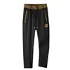 Pantalones deportivos casuales de verano finos con cintura elástica para hombre, elásticos, ajustados, estilo skinny, nuevos, combinan con todo, de seda helada para hombre
