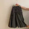 Suéter liso de color simple estilo coreano para niñas, nuevo diseño de otoño 2026, conjunto de dos piezas de pantalón falda a cuadros, moderno