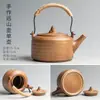 Cerámica Leña Vigas Elevadoras Hogar Cerámica Gruesa Tetera Retro Japonés Estufa Cálida para Té Cuerda Anti-Quemaduras Juego de Té Kung Fu