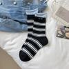 Calcetines para mujer 2025 primavera y verano nuevos calcetines de tubo a rayas calcetines de rizo doble Luo Kou para mujer calcetines Joker Zhuji al por mayor