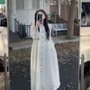 Vestido largo de manga larga plisado estilo coreano para mujer, nuevo diseño otoño 2026, de cintura alta, corte holgado, falda larga línea A, moderno