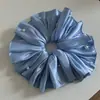 Estilo Francés Súper Hada Grande Moderno Plisado Perla Satén Anillo para el Pelo Grande Intestinal Flor de Cabeza Elegante Sensación de Alta Gama Anillo Intestinal Mujeres