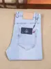 Pantalones de algodón elástico finos para hombre de primavera y verano, rectos, de cintura media, azul claro, fibra de poliéster, jeans blancos de moda para hombre