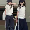 Conjunto de Primavera y Verano para Niñas 2026 Nuevo Conjunto Deportivo Infantil para Niños Mayores, Conjunto de Dos Piezas de Manga Corta de Moda Tendencia Infantil