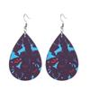 Venta Caliente Europea y Americana Copo de Nieve Navideño 20 Pares de Pendientes de Cuero Set Pendientes de Cuero con Cuadros Rojos y Gota de Agua Accesorios Festivos