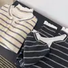 Nueva camiseta de moda coreana para principios de otoño, cuello redondo, bloques de color, estilo dos piezas falsas, manga larga para mujer, top holgado y estilizado para mujer