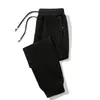 Pantalones gruesos con forro polar para otoño e invierno, nuevos, holgados, combinables, casuales, de moda, para hombre, pantalones deportivos de talla grande con cremallera y bolsillo.