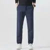 Feng She Roupa Masculina / 2026 Primavera/Outono Novos Calças Jeans Masculinas Americanas Largas de Perna Reta Cintura Meio Elástica Calças Casuais Calças Compridas Marca Tendência