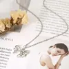 Nuevo Estilo Personalizado Moda Lazo Zirconia Colgante de Collar Todo-partido Gama Alta Regalo de Vacaciones Collar de Cadena para Clavícula