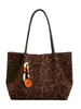 Bolsa Tote Estampa de Leopardo Feminina 2026 Nova Grande Capacidade para o Trabalho Bolsa de Ombro Estilo Coreano Moda Bolsa de Mão Versátil Tendência