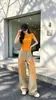 Conjunto Esportivo Casual Super Quente e Fresco de Dopamina para Mulheres Verão Redutor de Idade Manga Curta Jeans Degradê Calças Wide-Leg Conjunto de Duas Peças