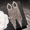 Aretes de tuerca con borla de circonita completa súper brillantes estilo Yang Mi de lujo ligero súper brillantes con borla de circonita completa elegantes de alta gama para fiesta