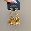 Brincos Geométricos de Strass em Forma de Gota d'Água Cross Mais Vendidos Leve Luxo Sensação de Alto Padrão Brincos Estilo Corte Retro Exquisitos Ornamentos de Orelha para Banquete
