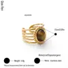 Anillo abierto de acero de titanio europeo y americano transfronterizo, oro de 18k, no se decolora, estilo vintage clásico, joyería de acero inoxidable incrustada con piedra de ojo de tigre