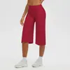 Pantalones capri de yoga de color liso, tela cepillada, estilo europeo y americano, transfronterizos, de cintura alta, control de abdomen, pierna ancha, casual para exteriores, atléticos y para fitness