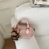 Bolso de hombro versátil para mujer, nuevo y moderno 2026, bolso de mano retro para otoño/invierno, bolso almohada, bolso bowling