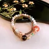 Pulsera deabalorios de la suerte de Cristal Súper Siete Negro Dorado Natural Doble Círculo Pulsera de Citrino para Mujer Pulsera de Anillo Corredor de Ágata Estilo Chino Nuevo