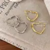 Ear Cuff de Corazón Hueco Simple Pendientes Metálicos de Corazón Grande Estilo Coreano Nicho Gama Alta Versátil Pendiente para el Trabajo Protectores de Pendientes
