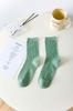 Calcetines suaves pegajosos para adultos color avena calcetines de media pantorrilla para mujer otoño e invierno hilo de puntos algodón puro boca suelta calcetines de felpa de doble aguja calcetines de posparto