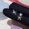 Aretes pequeños de mariposa con bloques de color, calados, diseño de nicho dulce y cool, para el cuidado de las orejas