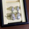 Brincos de pérolas de cristal de zircão requintados de luxo europeus e americanos, design de nicho, brincos de círculo de alta qualidade, brincos da moda para mulheres