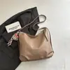 Bolsa de Ombro Grande e Elegante para o Dia a Dia de Mulheres 2026 Nova Moda Retrô Bolsa Tote Versátil de Nicho