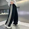 Pantalones casuales rectos de primavera para niños, nuevo estilo 2026, pantalones deportivos holgados para niños mayores, pantalones largos de primavera y otoño para niños, modernos
