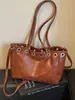 Bolso de mujer de gran capacidad, nuevo bolso tote vintage de otoño 2026 para ir al trabajo, bolso de hombro y cruzado versátil de alta gama