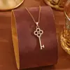Colar de aço titânio estilo japonês e coreano feminino versátil design de nicho corrente clavicular de alta qualidade luxo joia pingente de coração atacado