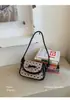 Bolso cuadrado pequeño dulce de nicho de moda coreana para mujer, nuevo y súper popular de moda primavera 2026, bolso de hombro y cruzado exquisito para salir
