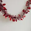 Guirlanda de decoração de Natal com folhas curvas, lantejoulas, fitas e tiras decorativas para decorações de festas de fim de ano e enfeites para pendurar
