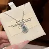 Nueva joyería de moda, collar de acero de titanio para mujer, cadena de clavícula exquisita y a la moda con circonitas de diamantes completos, colgante de lujo ligero