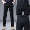 Pantalones casuales rectos de corte slim de color caqui de alta gama italianos, nuevo modelo de primavera, pantalones de vestir versátiles para hombres de mediana edad