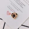 Venta al por mayor de accesorios de joyería DIY otoño e invierno Nuevo estilo aleación leopardo cuero melocotón corazón colgante aretes accesorios