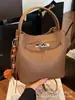 Bolso Cubo Versátil de Nicho Súper Popular Estilo Coreano 2026 Nuevo Bolso de Hombro Cruzado de Moda Casual para el Trabajo